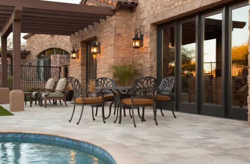 Concrete Patio Ideas On A Budget: a hous with a pool